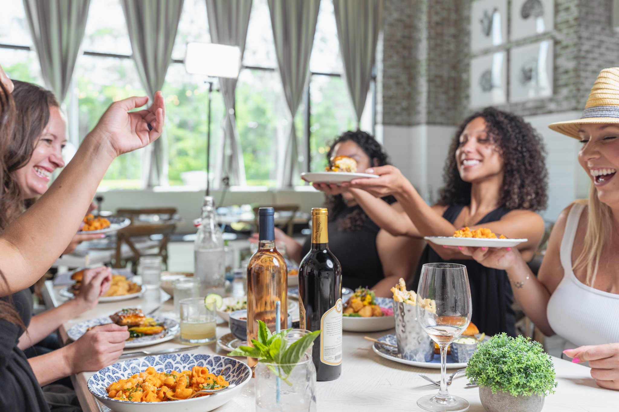 Friends sharing dinner for a restaurant TV commercial